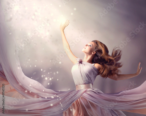 Photo: Beautiful Girl Wearing Long Chiffon Dress. Fantasy Scene Beautiful Girl Wearing Long Chiffon Dress. Fantasy Scene