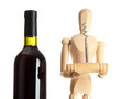 Mannequin with corkscrew and wine bottle, isolated on  white