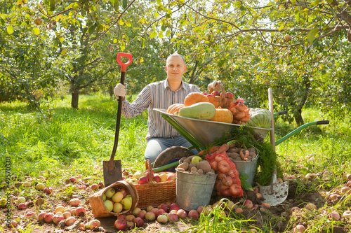 Photo: Happy man with vegetables harvest Happy man with vegetables harvest