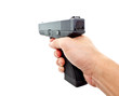 Photo: hand holding an automatic handgun hand holding an automatic handgun