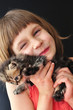 happy little girl with a cat