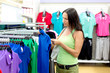 woman buys a T-shirt