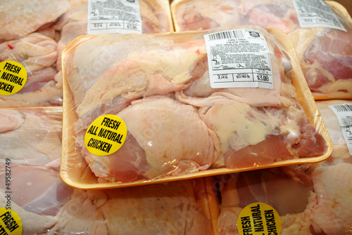 Photo: Raw Packaged Chicken Thighs Raw Packaged Chicken Thighs