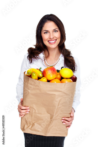 Photo: Young woman with a grocery bag. Young woman with a grocery bag.