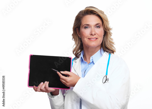 Photo: Medical doctor woman with tablet computer. Medical doctor woman with tablet computer.