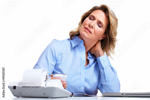 Photo: Business woman having a headache. Business woman having a headache.