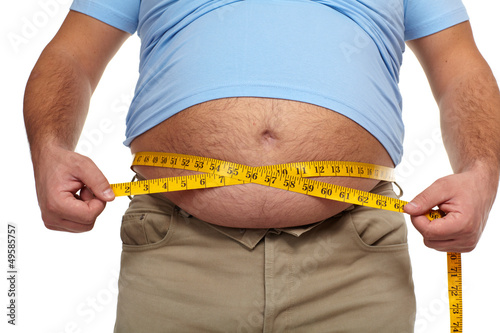 Photo: Fat man with a big belly. Fat man with a big belly.