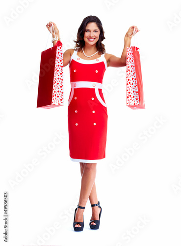 Photo: Beautiful woman with a shopping bags. Beautiful woman with a shopping bags.
