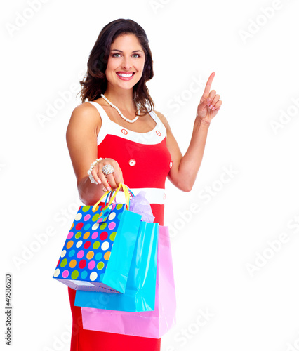 Photo: Beautiful woman with a shopping bags. Beautiful woman with a shopping bags.