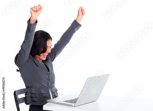 Photo: Happy business woman with laptop computer. Happy business woman with laptop computer.