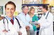 Pharmacist with a senior couple.