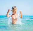 Young boy swimming in sea