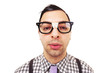 Funny portrait of young nerd with eyeglasses