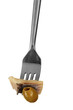 Piece of herring and olive on fork isolated on white