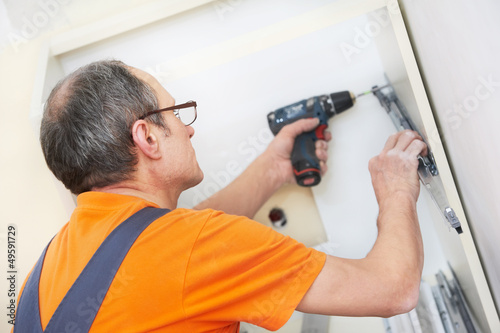 Photo: kitchen installer at carpenter work kitchen installer at carpenter work