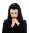 Photo: Businesswoman with hands at chin Businesswoman with hands at chin