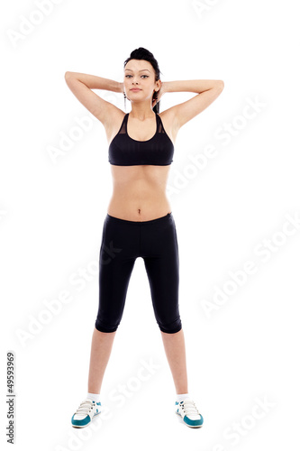 Photo: Young lady exercising Young lady exercising
