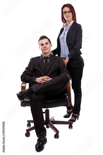 Photo: Businesswoman and businessman in full length pose Businesswoman and businessman in full length pose
