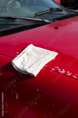 Photo: washing a red trck washing a red trck