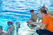 happy children group  at swimming pool