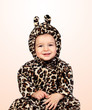 Adorable baby girl with leopard costume