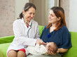 Photo: pediatrician examining newborn baby pediatrician examining newborn baby