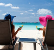 Luxury vacation for woman. White tropical beach.