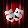 Theater masks with red curtain