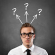 Man at the Blackboard with Questions