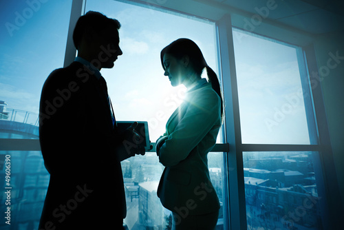 Photo: Colleagues by the window Colleagues by the window