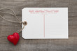 Foto: Ein Liebesbrief mit rotem Herz als Postkarte Ein Liebesbrief mit rotem Herz als Postkarte