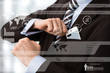 Businessman in luxury suit in front of digital vurtual screen