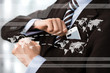 Closeup of torso of confident business man wearing elegant suit