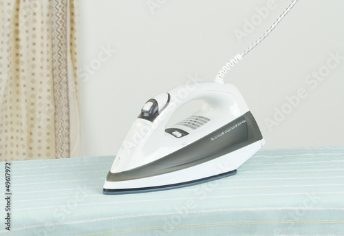 Photo: Modern steam iron the new technology for ironing. Modern steam iron the new technology for ironing.