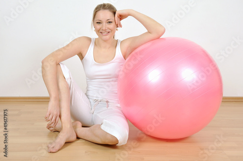 Photo: Junge Frau beim Sport Junge Frau beim Sport