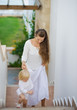 Photo: Mother and baby walking up stairs Mother and baby walking up stairs