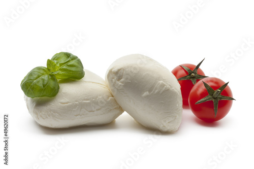 Photo: Fresh Mozzarella with basil leaves and tomatoes Fresh Mozzarella with basil leaves and tomatoes