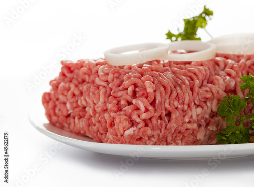 Photo: minced meat on white background minced meat on white background