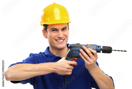 Photo: Builder drilling Builder drilling