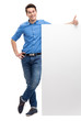 Man with blank poster showing thumbs up