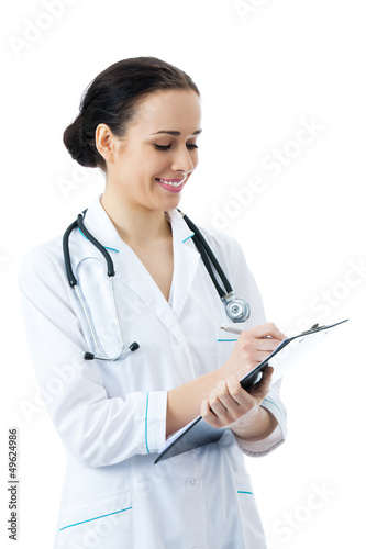 Photo: Doctor writing on clipboard, on white Doctor writing on clipboard, on white