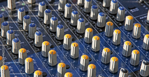 Photo: potentiometers trimmers and a mixer during a concert potentiometers trimmers and a mixer during a concert