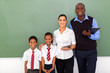 group of elementary school teachers and students