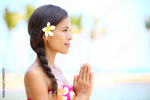 Photo: Serene meditation - meditating woman on beach Serene meditation - meditating woman on beach
