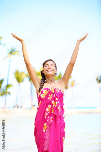 Photo: Free spiritual woman on hawaii on beach Free spiritual woman on hawaii on beach