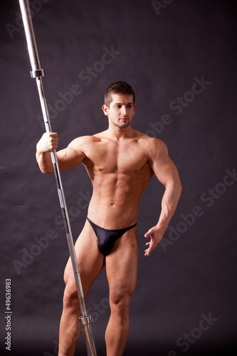 Photo: young bodybuilder traininig young bodybuilder traininig