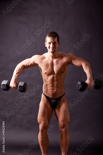 Photo: young bodybuilder traininig young bodybuilder traininig