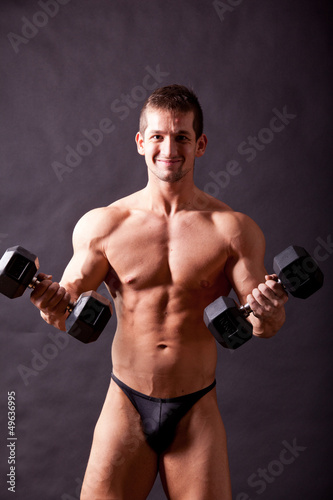 Photo: young bodybuilder traininig young bodybuilder traininig