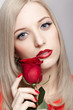blonde woman with rose