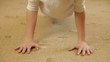 Child Doing Push-Ups At Home